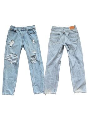 Distressed Light Blue Levi 550 Jeans